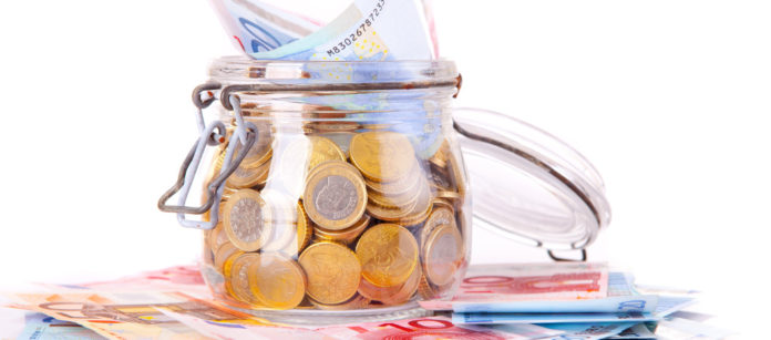 Money in glass container