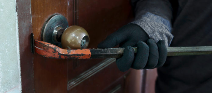 Burglar breaks door Burglar breaks door