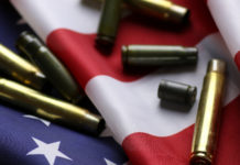 Bump stock: il flop della consegna nel Vermont prima che diventassero illegali American flag with bullets