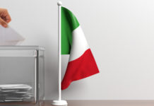 Referendum propositivo: la posizione delle associazioni venatorie Referendum propositivo la posizione delle associazioni venatorie: bandiera italiana accanto a urna