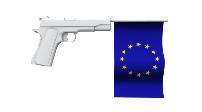 Ricorso della Repubblica Ceca contro la Direttiva armi la sentenza della Corte di Giustizia Ricorso della Repubblica Ceca contro la Direttiva armi: bandiera dell'Unione europea dentro una pistola